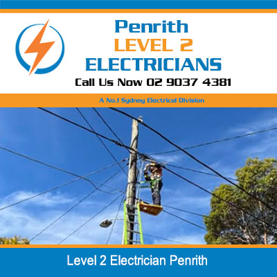 Level 2 electrician in cherry picker bucket working on power pole and lines in Penrith
