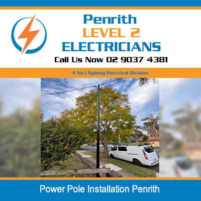 Power pole installation in residential street with utility van in Penrith